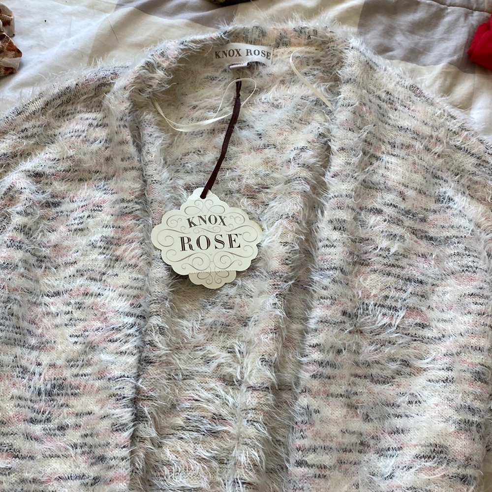 Nwt fuzzy cardigan style sweater. Long